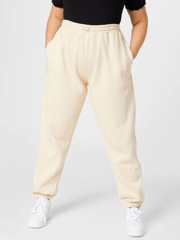 Public Desire Curve Tapered Pants in White: front