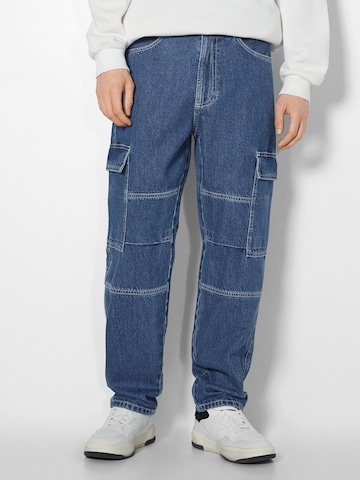 Bershka Loose fit Cargo jeans in Blue: front