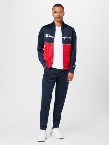 Champion Authentic Athletic Apparel Tracksuit in Blue