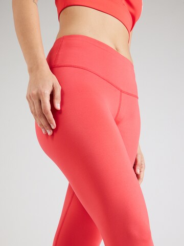 Skinny Pantaloni sport 'Hibiscus' de la Hey Honey pe roșu