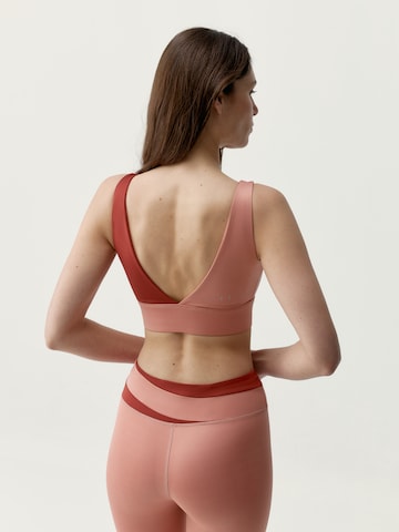 Bustier Soutien-gorge de sport 'Kate' Born Living Yoga en orange
