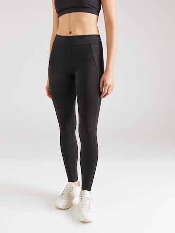 Reebok Skinny Workout Pants in Black: front