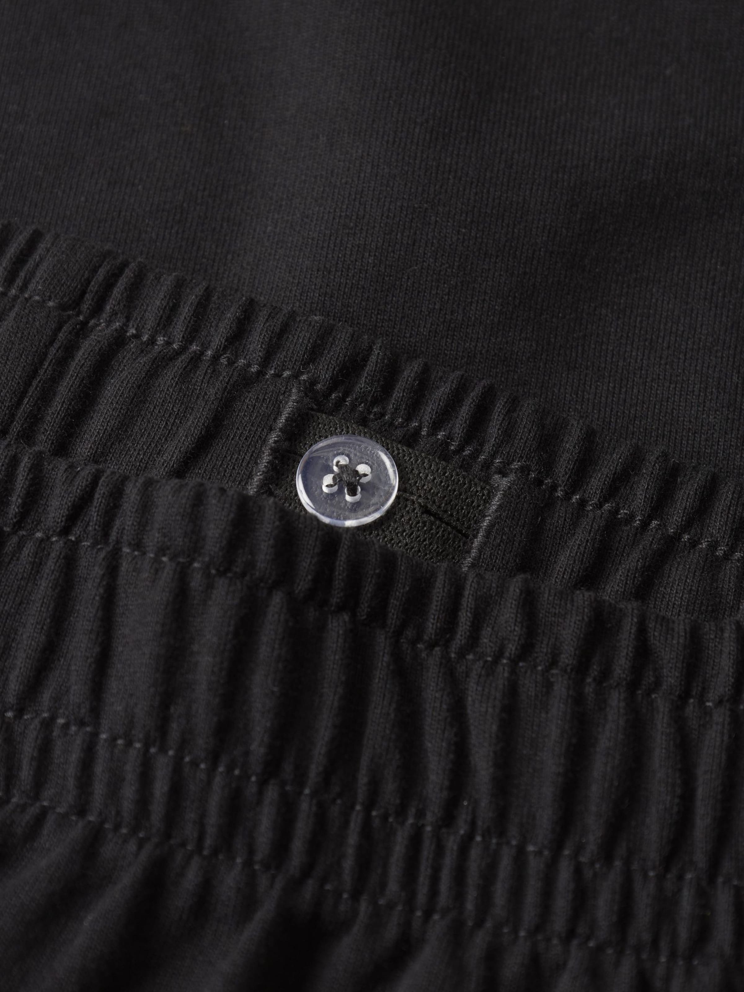 TWO SOON - Regular Calças em preto