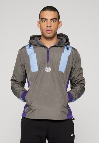 Giacca di mezza stagione 'Dmwu' di Unfair Athletics in grigio: frontale