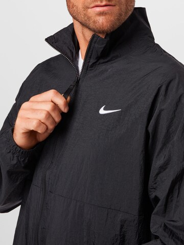 NIKE Sportjacke 'Starting 5' in Schwarz