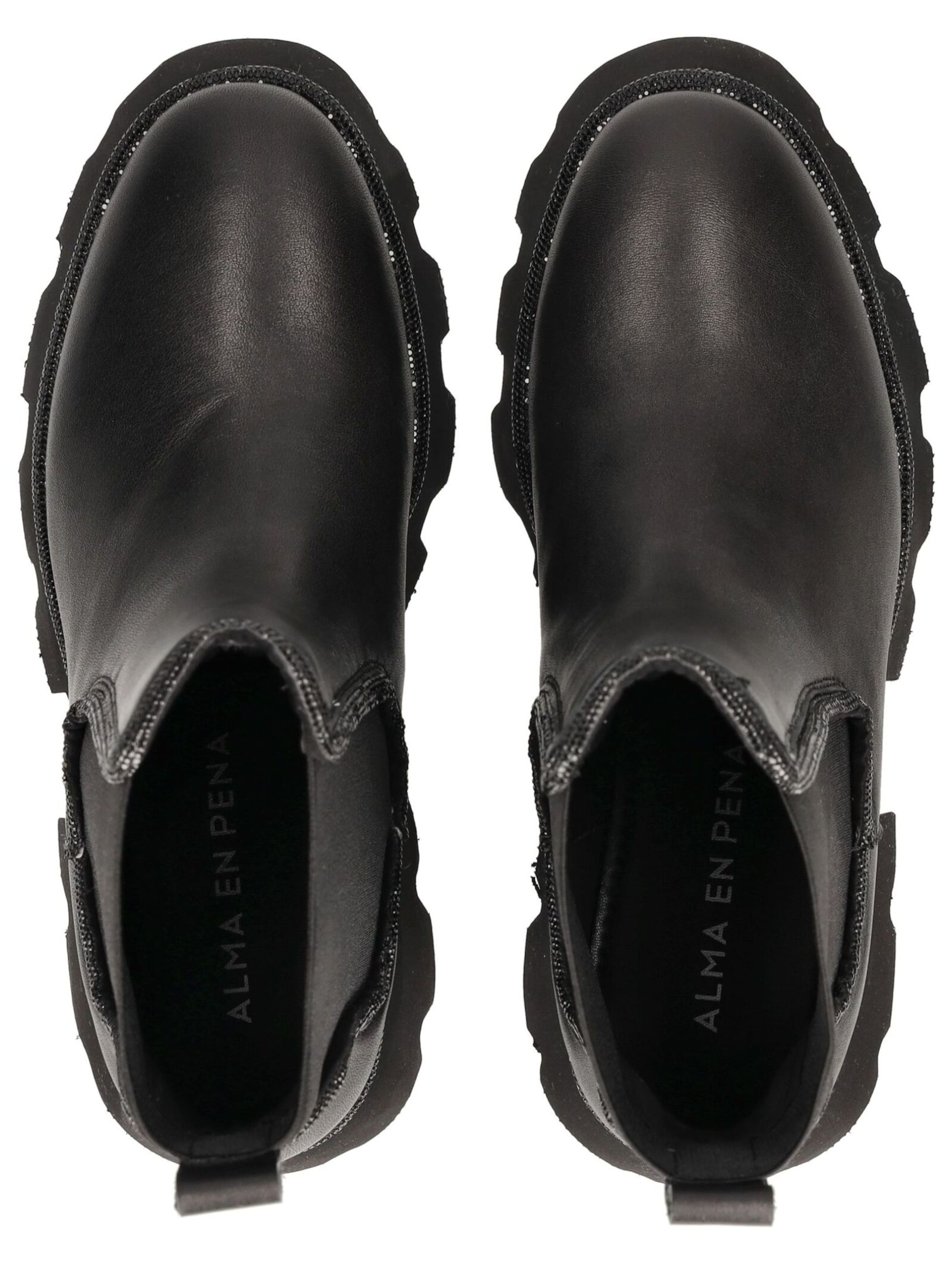 Alma En Pena Chelsea boots in Black