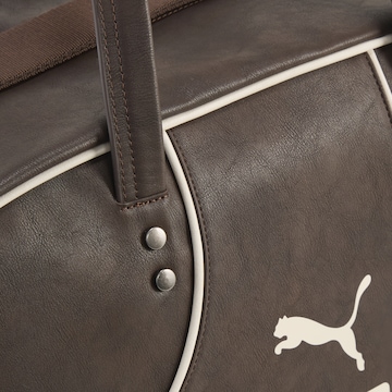 PUMA Sports bag '1976' in Brown