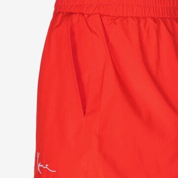 Karl Kani Loose fit Pants in Red