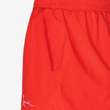 Karl Kani Loosefit Shorts in Rot
