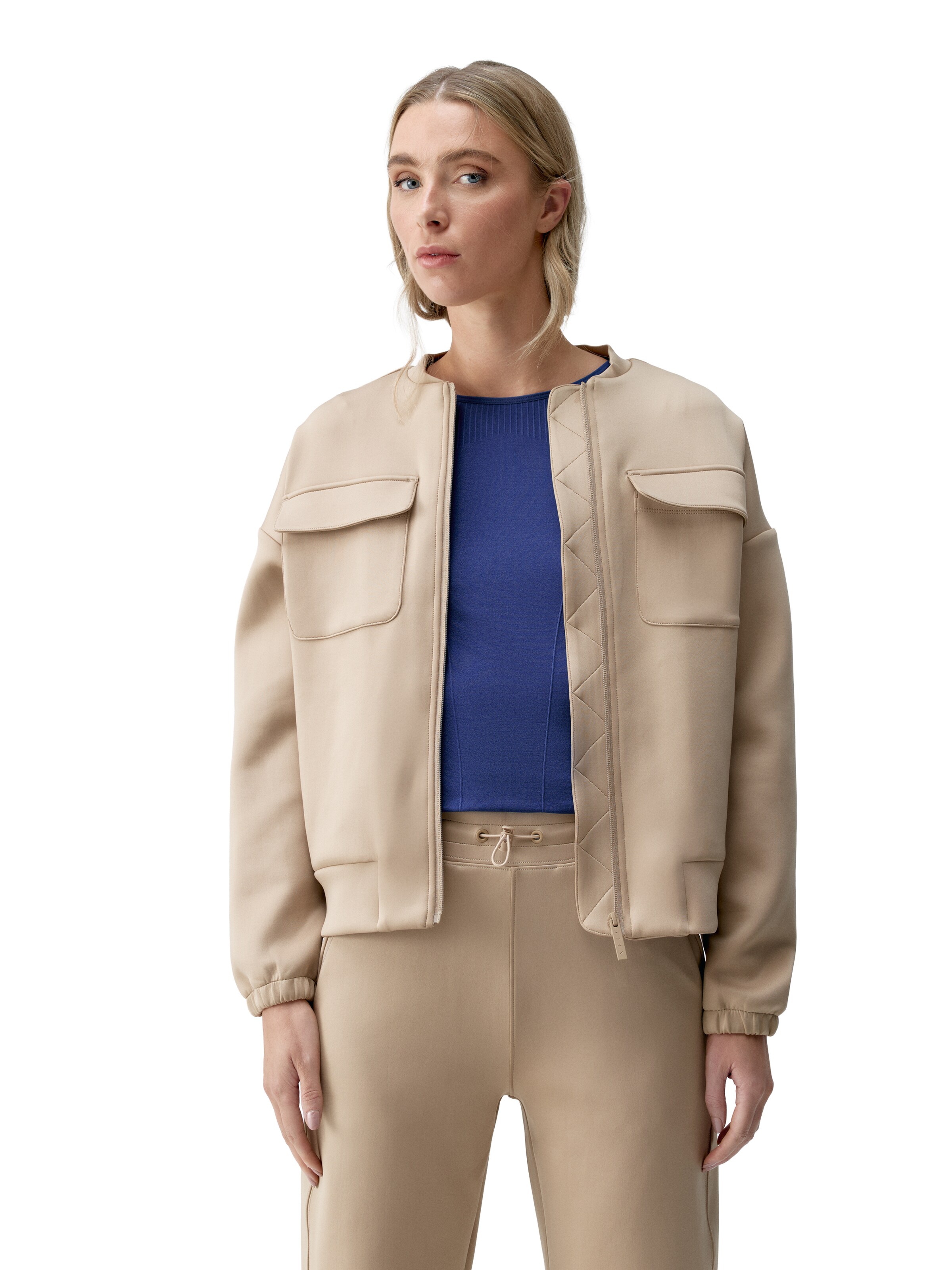 Veste mi-saison 'Graft' Born Living Yoga en beige : devant
