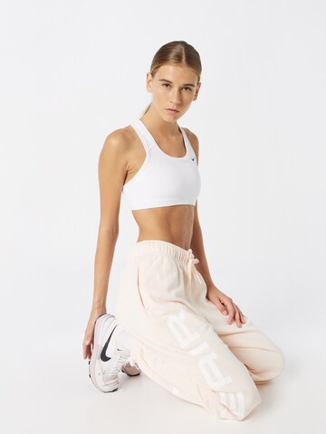 Effilé Pantalon Nike Sportswear en rose