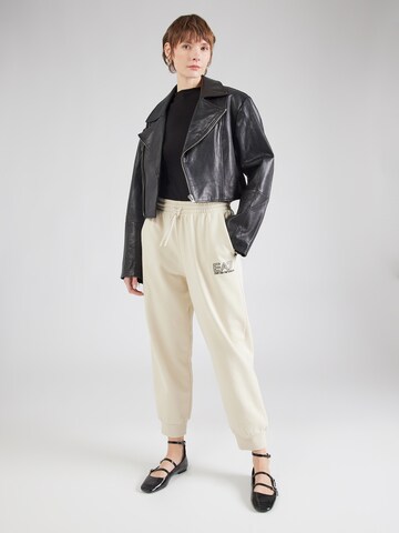 Tapered Pantaloni 'TRAIN VISIBILITY' di EA7 Emporio Armani in beige