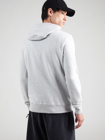 Hanorac sport de la ASICS pe gri