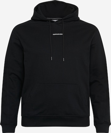 Sweat-shirt Calvin Klein Jeans en noir : devant