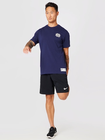 NIKE - Camiseta funcional 'PREMIUM' en azul