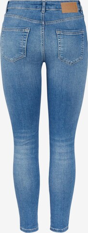 PIECES Skinny Jeans 'Delly' in Blauw