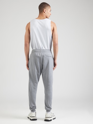UNDER ARMOUR Tapered Sporthose 'Rival' in Grau