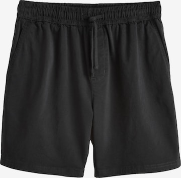 Pantaloni de la Next pe negru: față