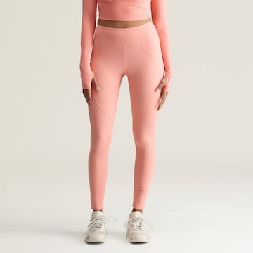 ADIDAS BY STELLA MCCARTNEY - Skinny Pantalón deportivo en naranja: frente