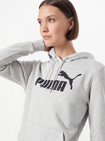 PUMA قميص رياضي 'ESSENTIAL Logo Hoodie' بلون رمادي