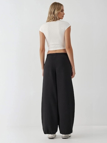 Hiccup - Folgado Calças em preto