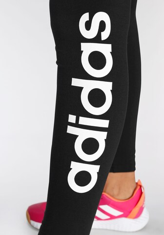 ADIDAS SPORTSWEAR Tapered Workout Pants 'Essentials Linear Logo ' in Black