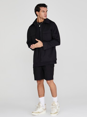 SikSilk Tussenjas in Zwart