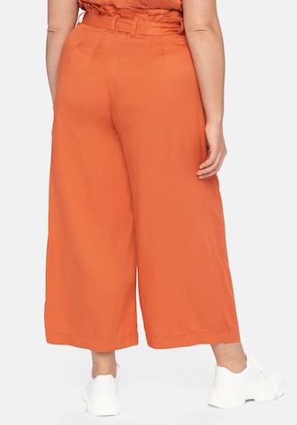 SHEEGO Pants in Orange