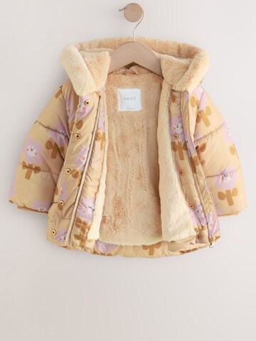 Next Välikausitakki värissä keltainen