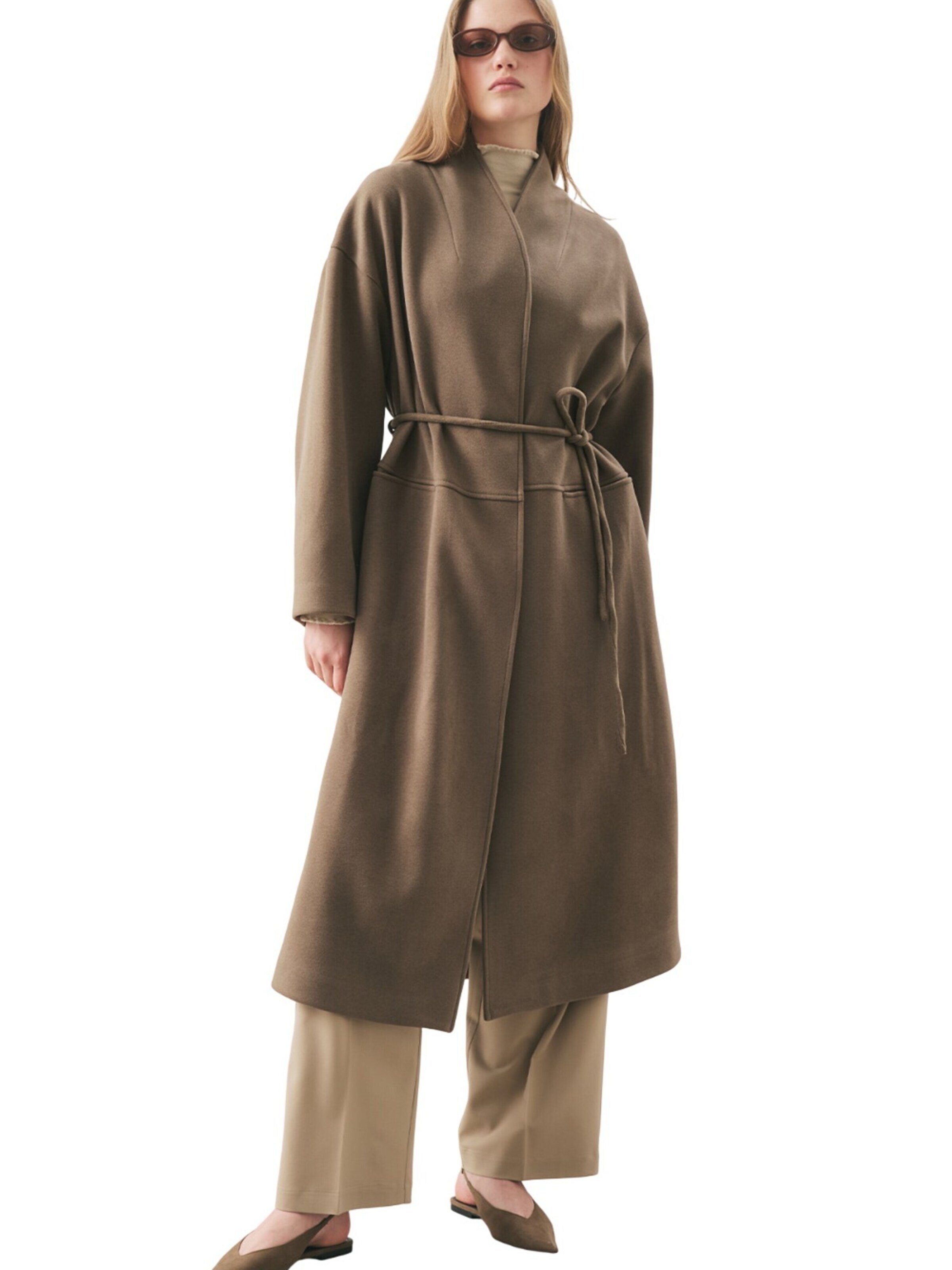 MANUKA Between-seasons coat in Green: front