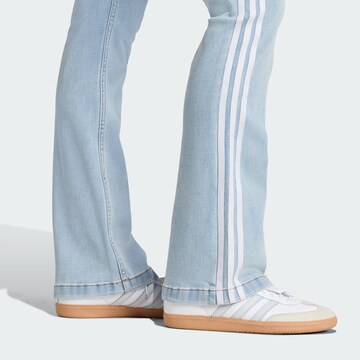 Coupe slim Jean 'Adilenium Season 4 Teamgeist' ADIDAS ORIGINALS en bleu