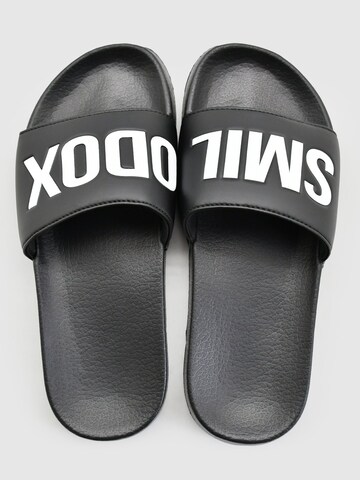 Claquettes / Tongs 'Corbin' Smilodox en noir