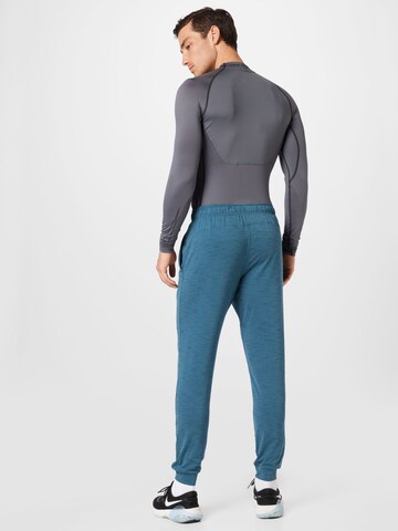 NIKE Normální Sportovní kalhoty – modrá