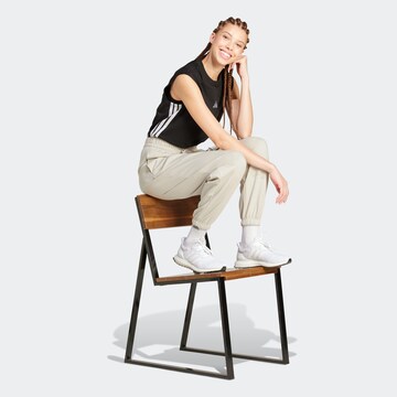 ADIDAS SPORTSWEAR - Tapered Pantalón deportivo 'Essentials' en beige