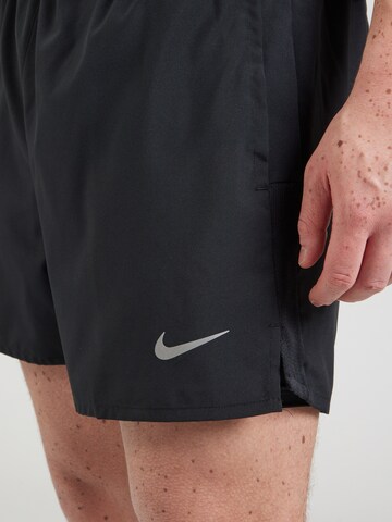 NIKE Regular Urheiluhousut värissä musta