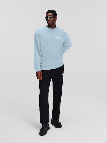 Karl LagerfeldSweater majica 'Ikonik Outline' - plava boja