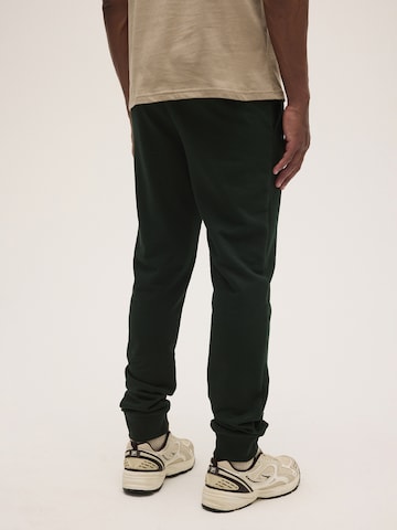 FILA Regular Housut 'LUNIGO sweat pants' värissä vihreä