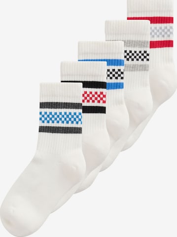 Next Sockor i vit: framsida