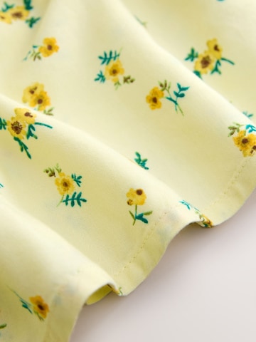 Next Mekko värissä keltainen