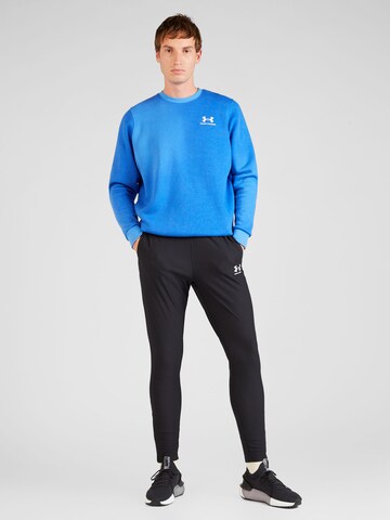 UNDER ARMOUR Sportsweatshirt 'Essential Novelty' i blå