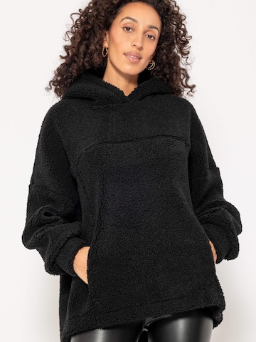 SASSYCLASSY Oversized Sweater in Black: front
