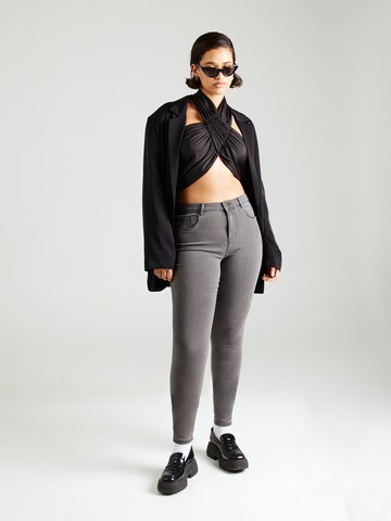 Skinny Jeans 'CARTHUNDER' di ONLY Carmakoma in grigio