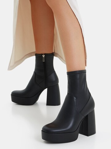 Bershka Bootie in Black: front