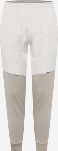 UNDER ARMOUR Workout Pants 'Storm' in Beige: front