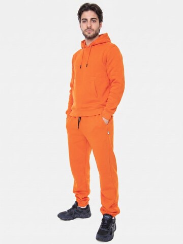 KANGOL Baggy Bukser 'M' Tuta Essential Col 118 Orange Pants' i orange: forside