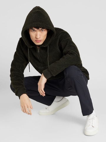 PEAK PERFORMANCE Sport sweatshirt 'Ground Pile' i grön