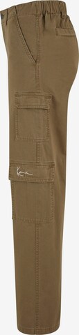 Wide leg Pantaloni cargo di Karl Kani in verde
