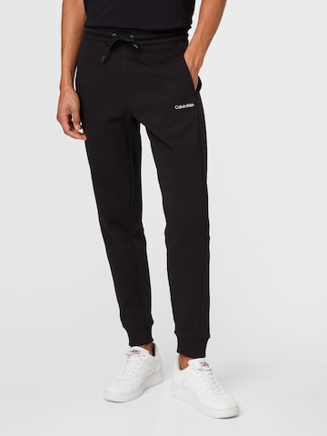 Pantaloni di Calvin Klein in nero: frontale