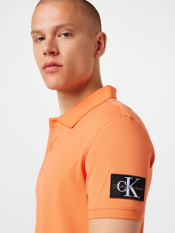 Calvin Klein Jeans Poloshirt in Orange