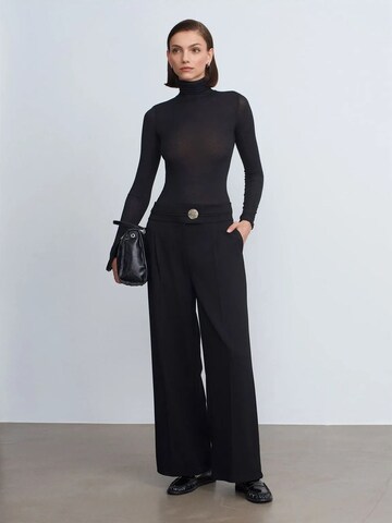 Wide leg Pantaloni di Dilvin in nero